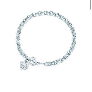 Tiffany & Co.  it has RW engraved on it.